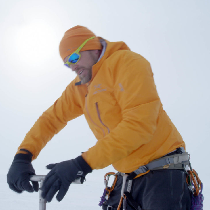 Jason Box takes a snow sample on the Greenland Ice Cap. 