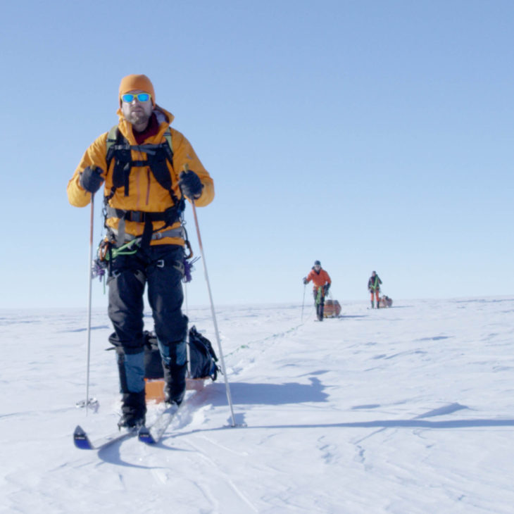 Jason Box explores the Greenland Ice Cap using skis and haul sleds.